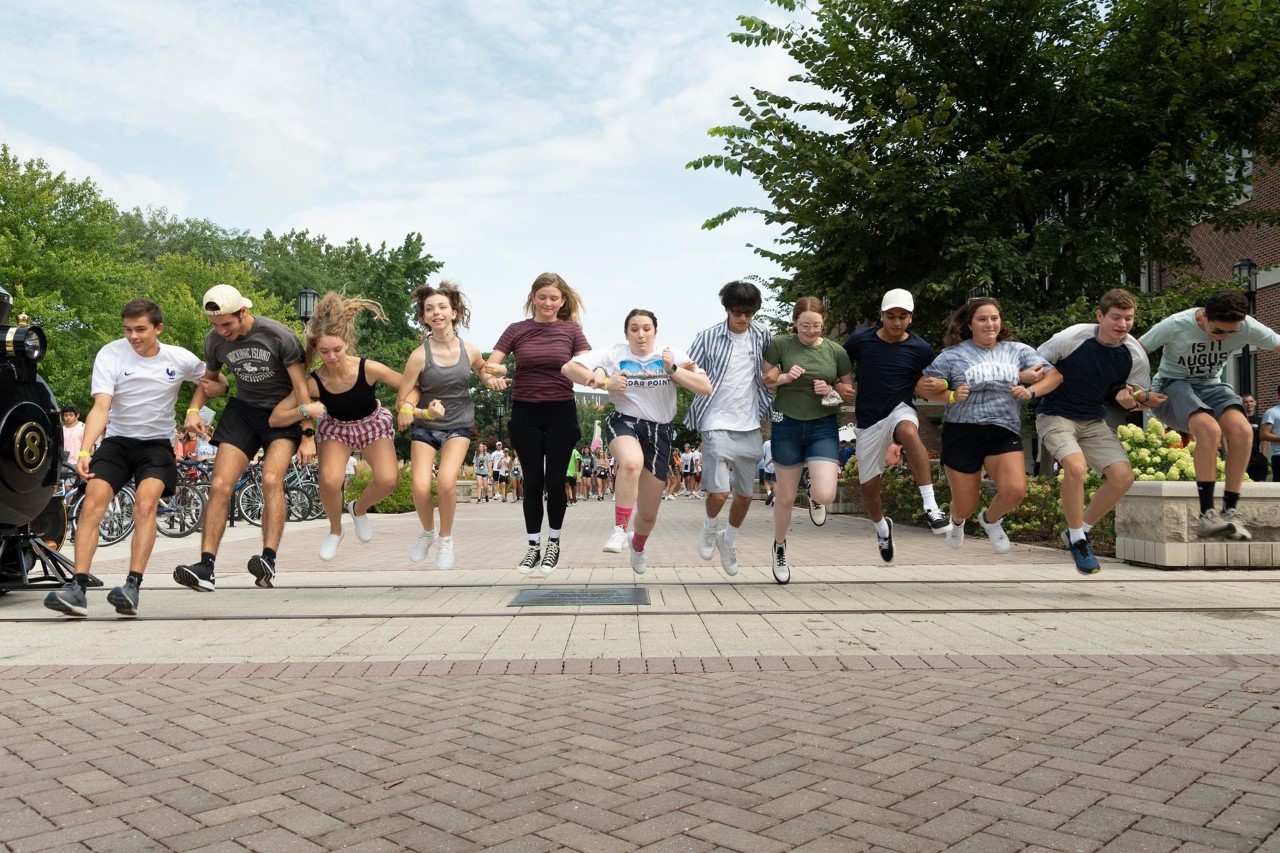 Freshman students Crossing over the Tracks tradition