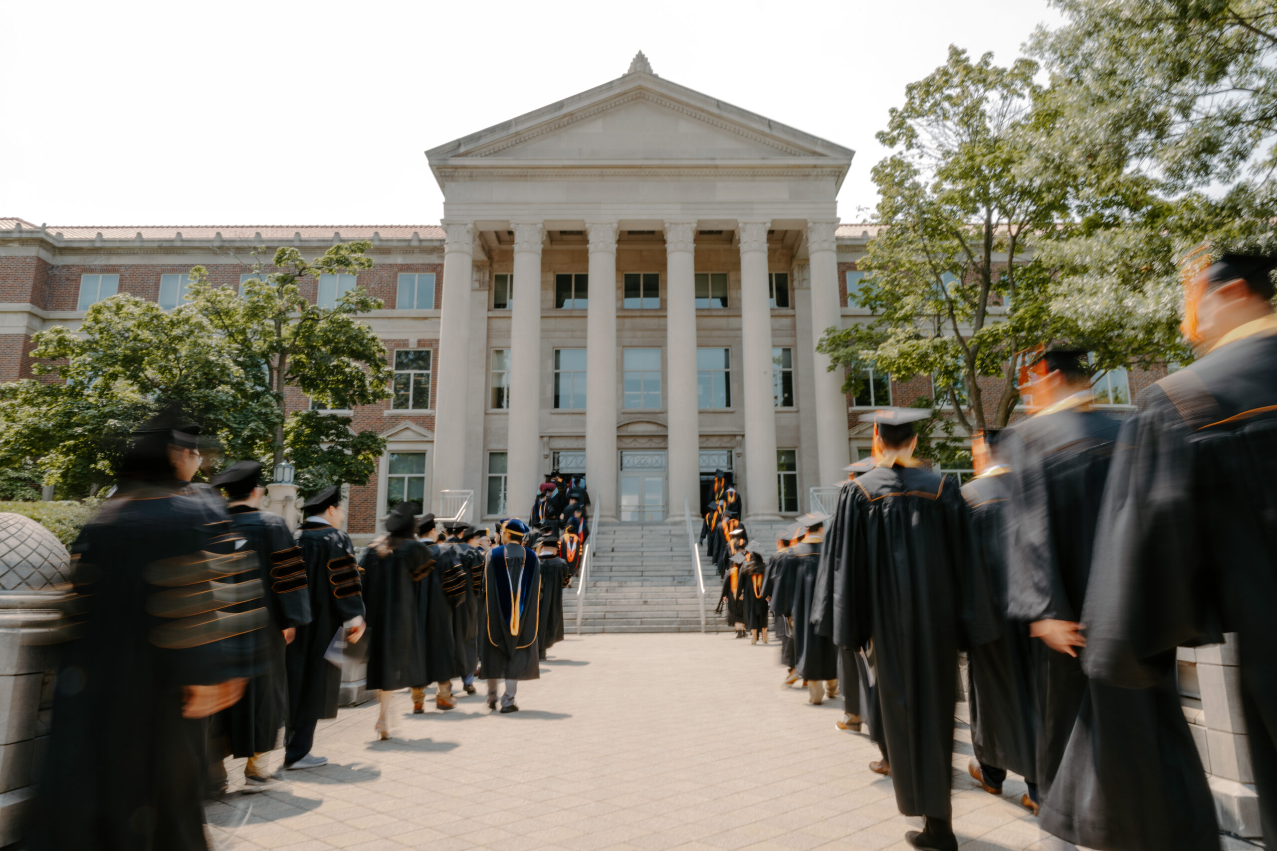 Graduates walking outside