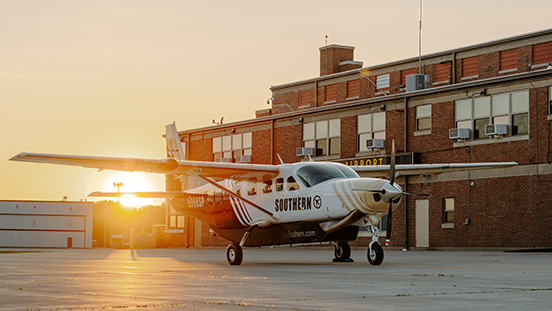 A Southern Airways Express plane on the tarmac at Purdue University Airport.  
