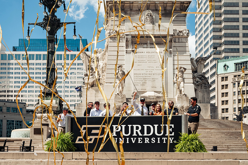 Confetti flies in Monument Circle Thursday (June 27) as Purdue University celebrates the inauguration of its Indianapolis extension.