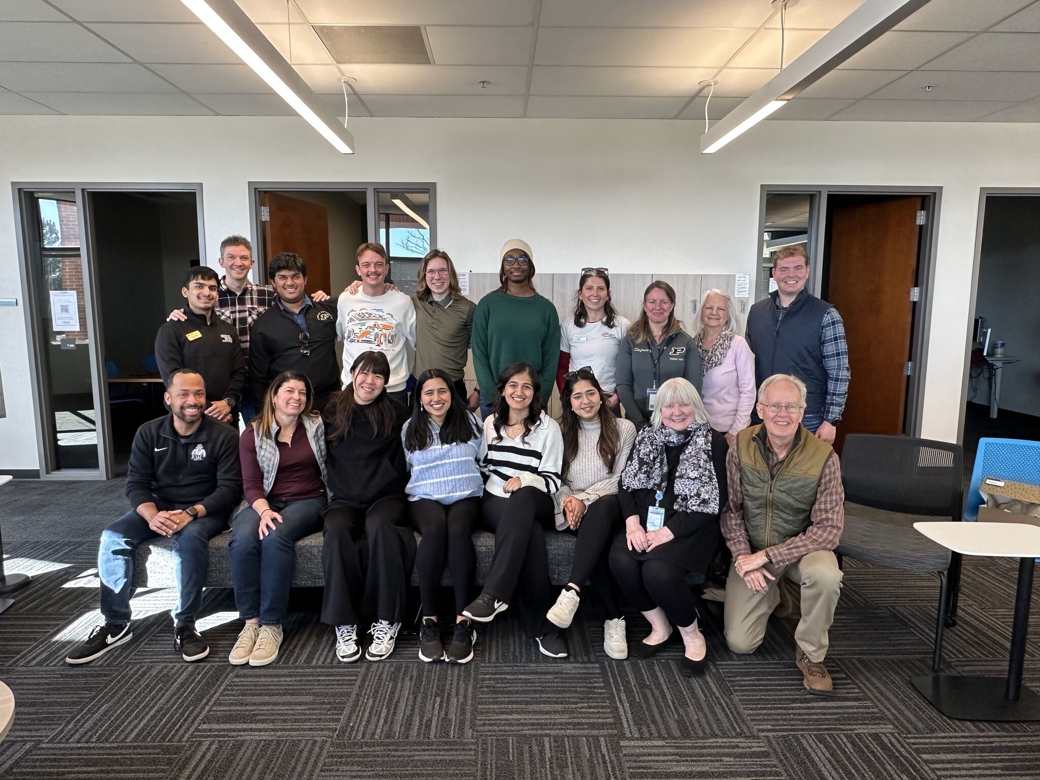 A group photo of students in the EIR learning community with a visiting executive