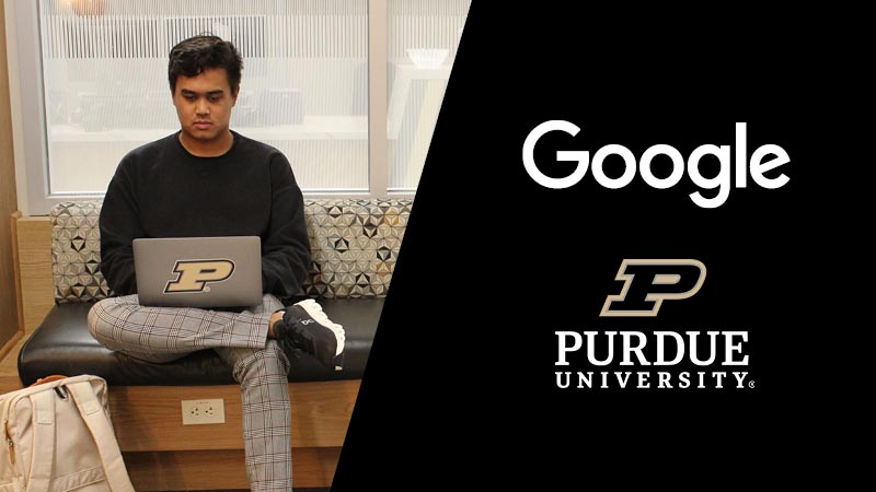 A Purdue University student on his laptop.