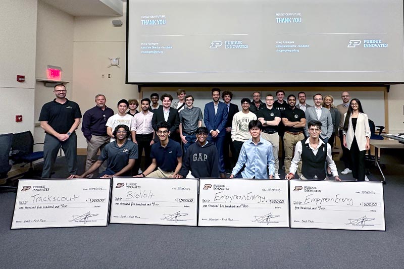 Purdue students celebrating their victory at the Moonshot Pitch Challenge.