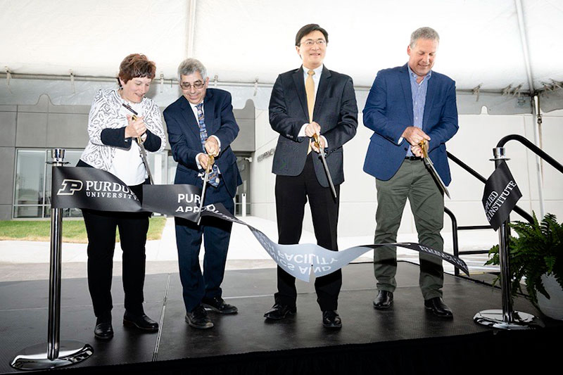 From left, Karen Plaut, executive vice president for research; Mark Lewis, CEO of PARI; Mung Chiang, Purdue University president; and Scott Meyer, managing director, Maurice J. Zucrow Laboratories, celebrate the opening of the Hypersonics and Applied Research Facility. (Purdue University photo/Charles Jischke)