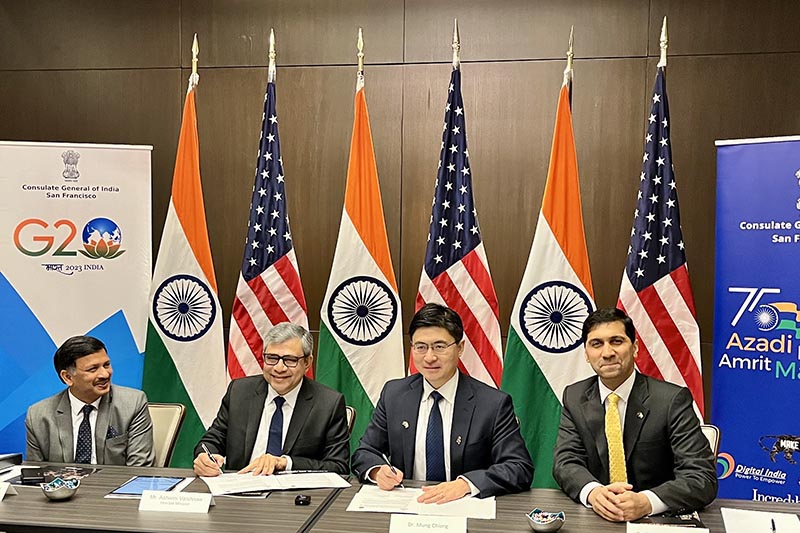 Purdue has entered into another landmark international agreement, this one with the government of India, to advance workforce development, research and development, and industry partnerships in semiconductors. At a signing ceremony on Tuesday (May 9) are, from left, T.V. Nagendra Prasad, Consul General of the Indian Consulate in San Francisco; Honorable Ashwini Vaishnaw, India's Union Minister for Railways, Communications, Electronics and IT; Purdue President Mung Chiang; and Vijay Raghunathan, Purdue professor and Associate Head of Electrical and Computer Engineering and Director of Semiconductor Education for Purdue. (Purdue University photo)