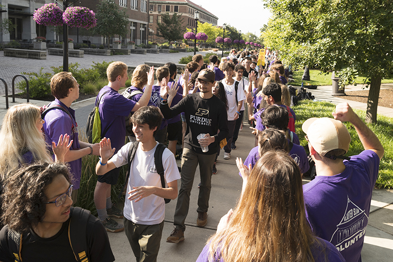 Purdue University students walking through campus.