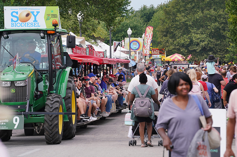 A crowd of people navigating the Indiana State Fair