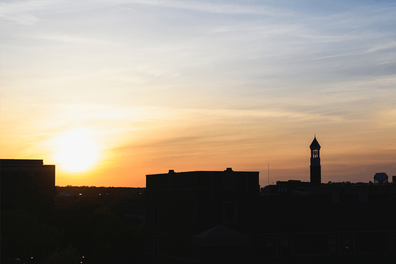 Purdue University buildings during a sunset