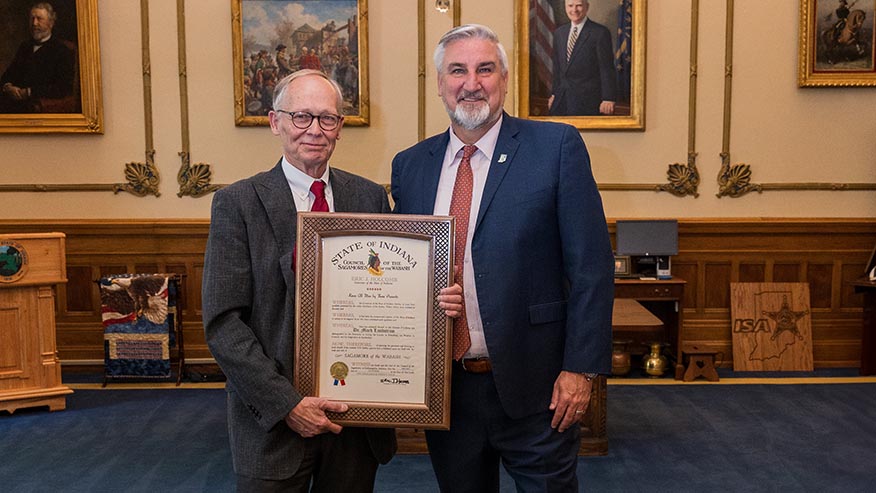 Mark Lundstrom and Indiana Governor Eric J. Holcomb