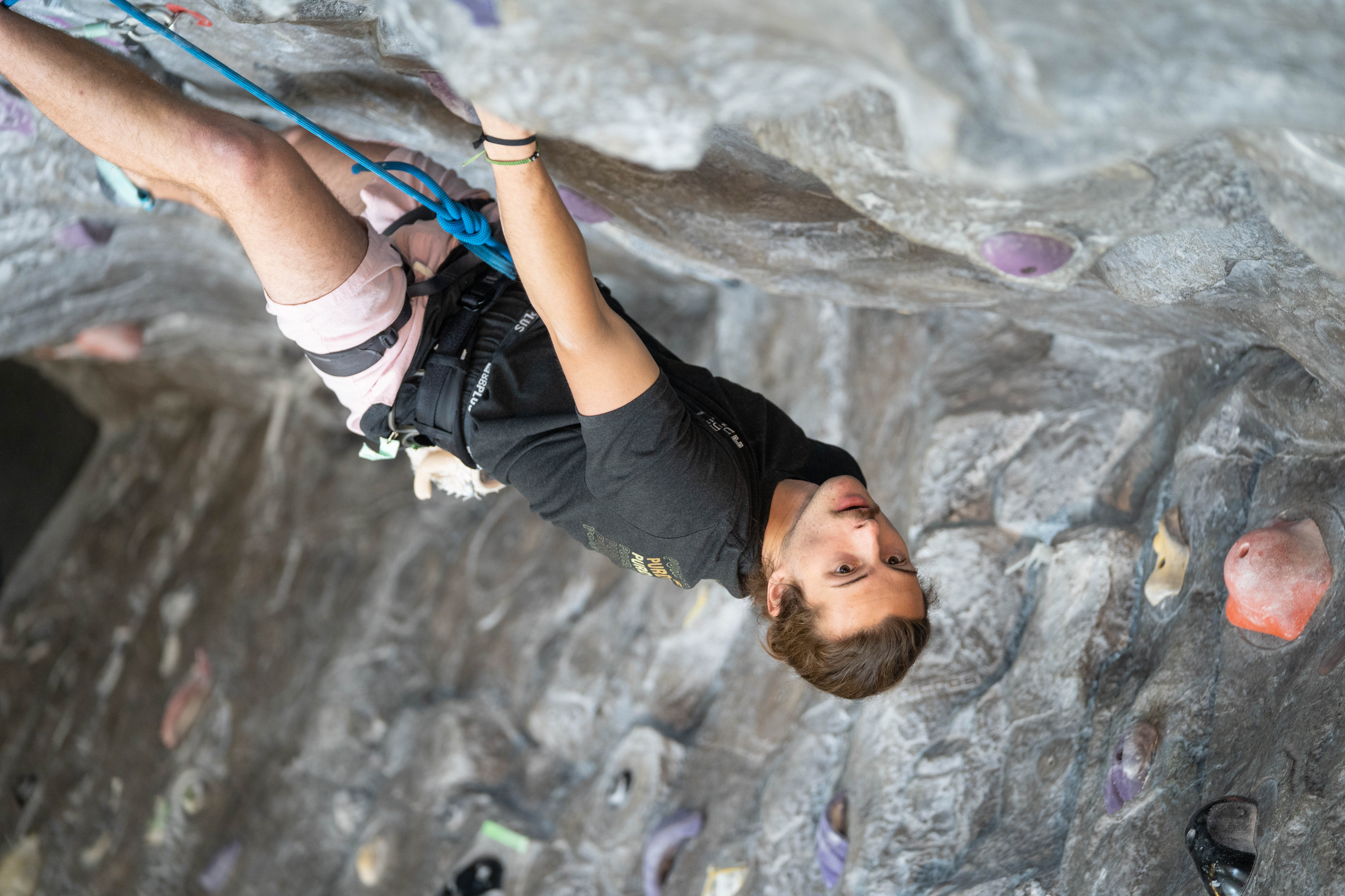 Climber on Top Rope Wall