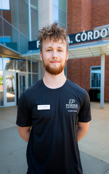 Outdoor headshot of personal trainer