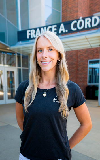 Outdoor headshot of personal trainer