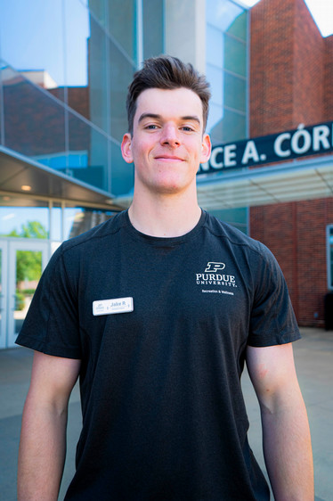 Outdoor headshot of personal trainer