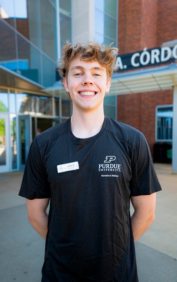 Outdoor headshot of personal trainer