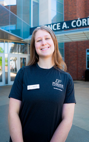 Outdoor headshot of personal trainer