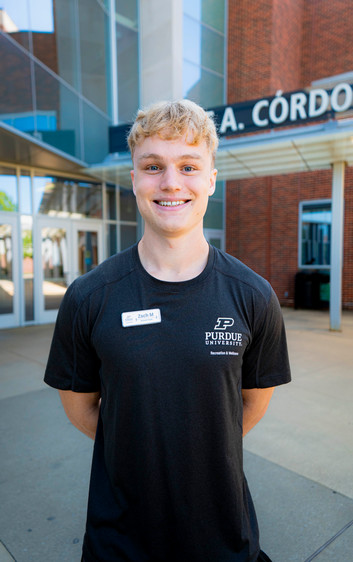 Outdoor headshot of personal trainer