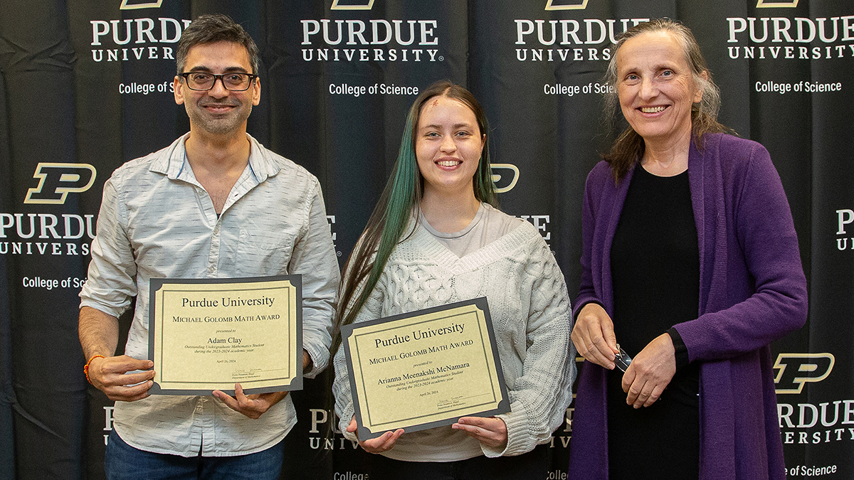 Adam Clay and Arianna Meenakshi McNamara receive the Michael Golomb Math Award.
