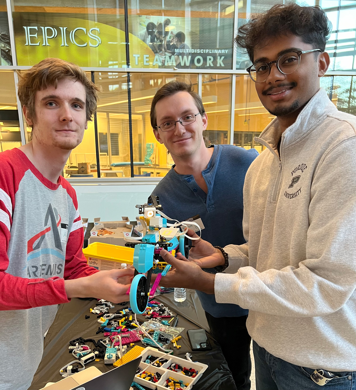 Students at a table during a LEGO event