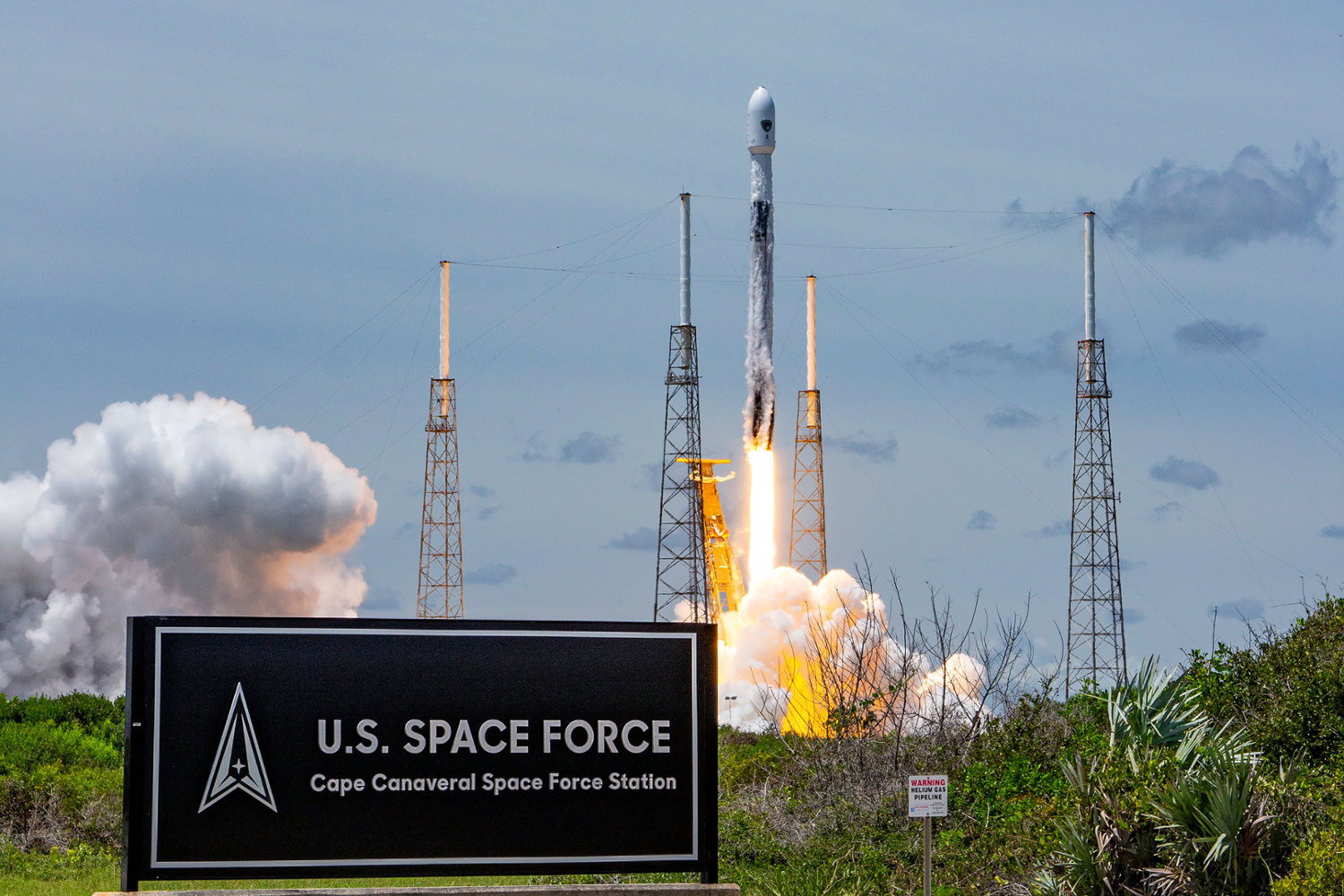 A Falcon 9 rocket carrying a GPS III-5 satellite into orbit launches from LC-40 at Cape Canaveral Space Force Station, Fla.