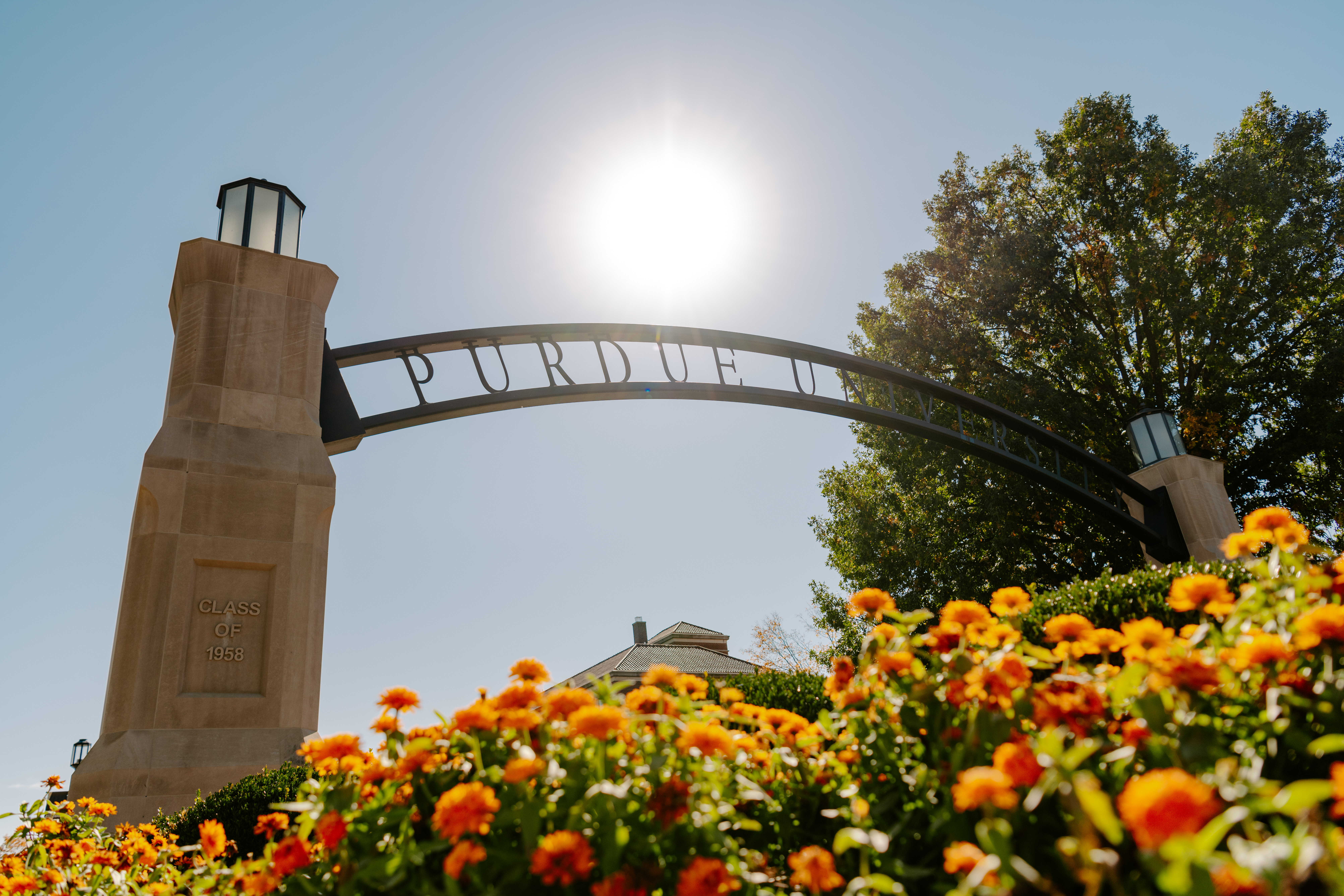 photo of purdue arch with flowers