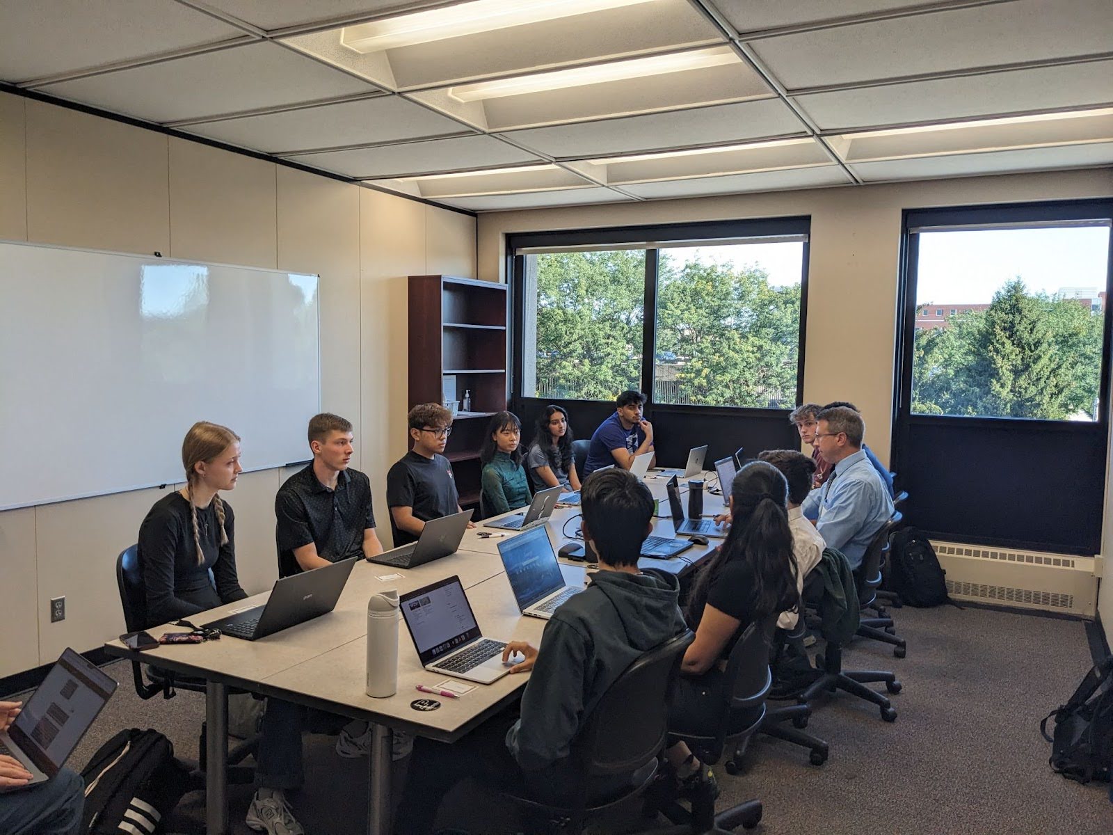 Purdue students in Indianapolis meet for a team meeting with their industry mentor in The Data Mine’s Corporate Partners program.