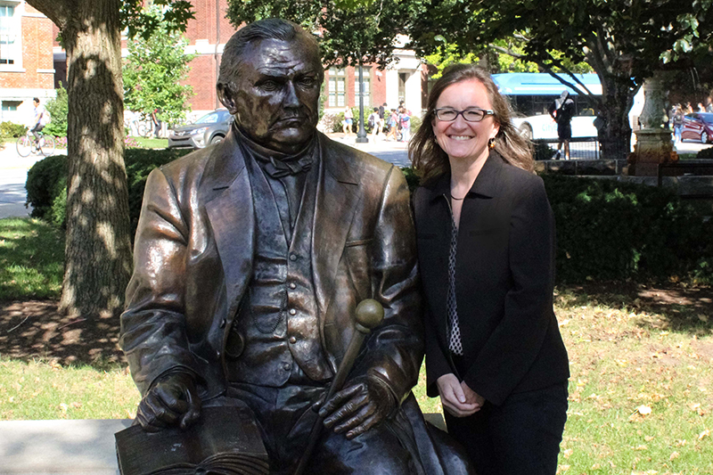 Laura Murray-Kolb with John Purdue statue