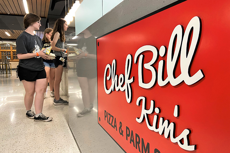 Students wait in line at Chef Bill Kims