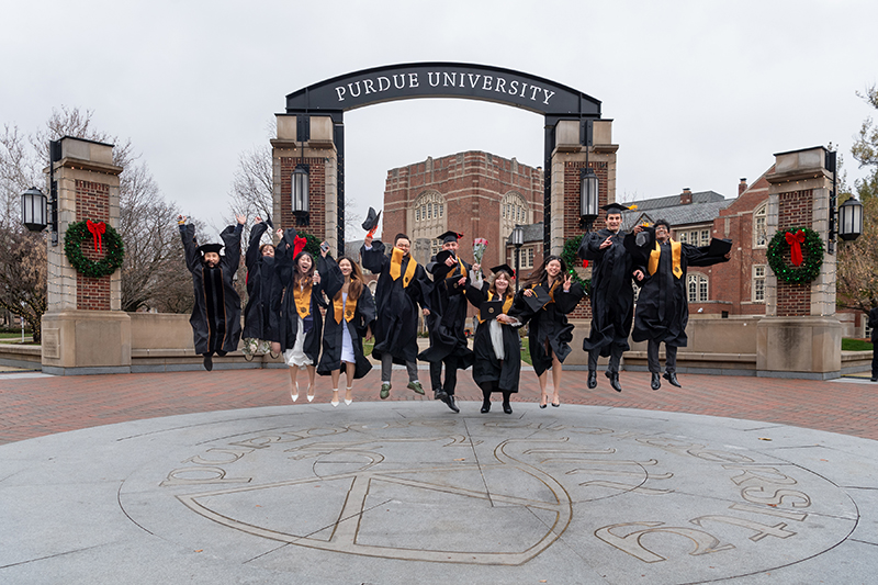 Graduates in front of Union Arch