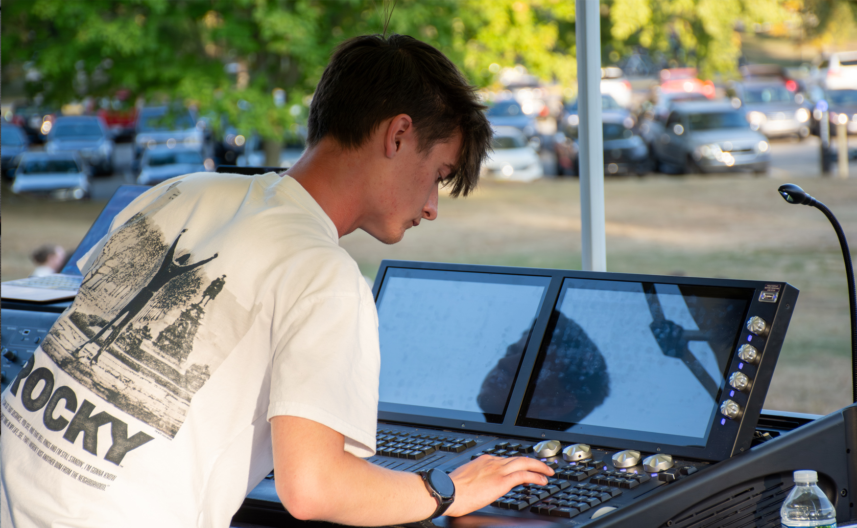 A photo of a staff member working on the production board for the live event 